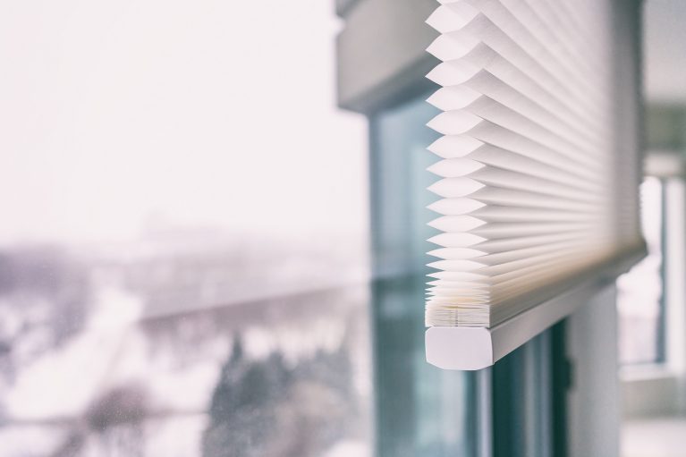 Home blinds - cordless cellular honeycomb pleated shade modern shades on apartment windows. Automated curtains blind.